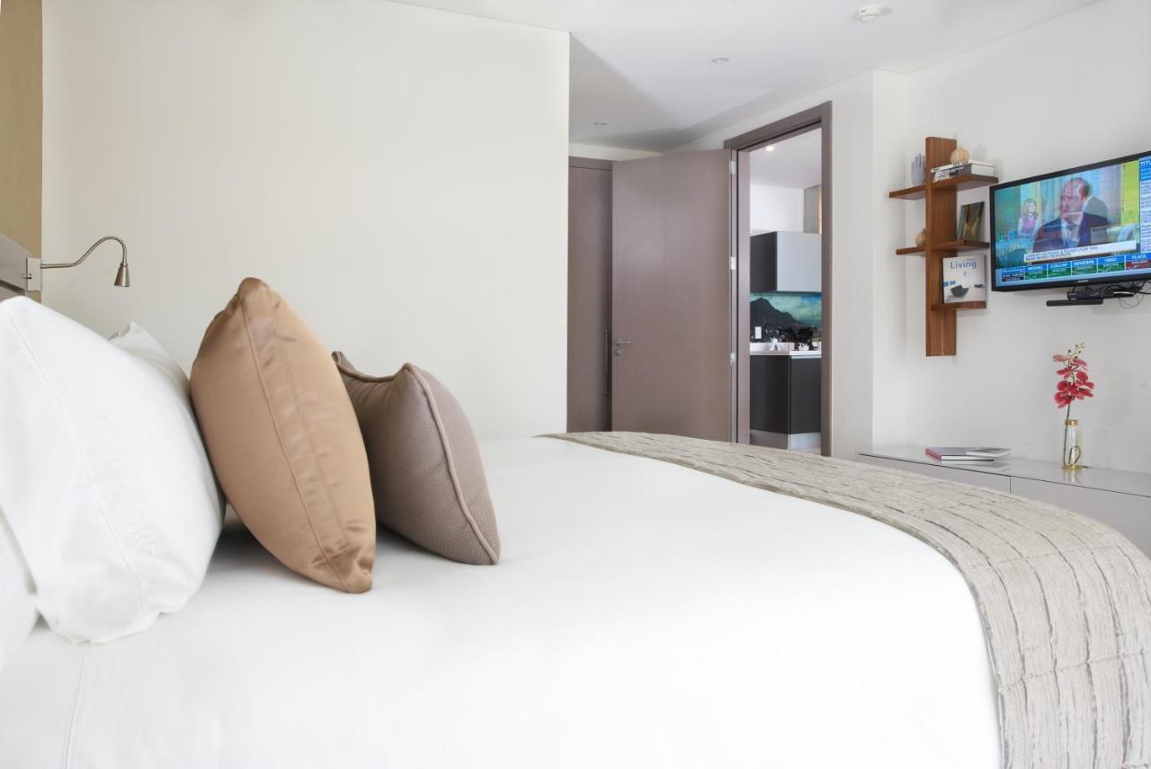 Hotel 100 Luxury Suites By Preferred Bogotá Exteriör bild A bedroom at the hotel